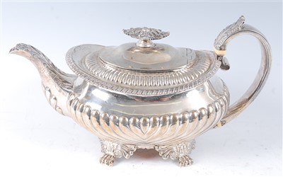 Lot 1137 - A George IV silver teapot, of squat oval form,...