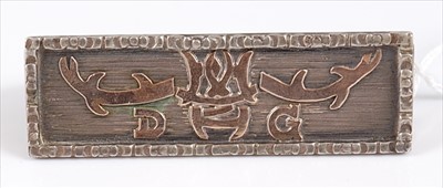 Lot 319 - A Japanese white metal and yellow metal...