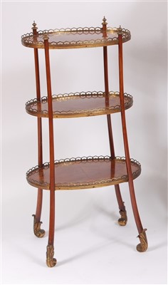 Lot 1501 - A late 19th century kingwood three tier...
