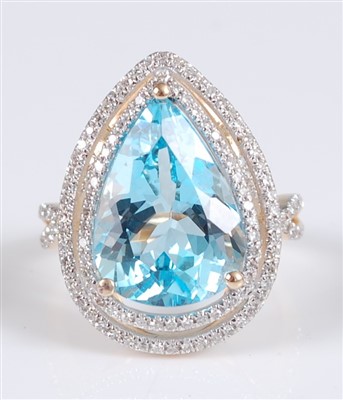 Lot 1214 - A yellow metal pear shaped blue topaz and...