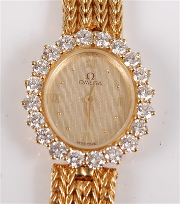 Lot 1252 - An 18ct yellow gold lady's Omega quartz...