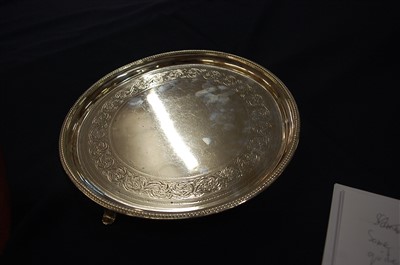 Lot 1138 - A George III silver salver, having a gadrooned...