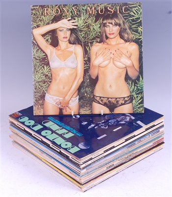 Lot 672 - A collection of vinyl LP's and 12" records to include