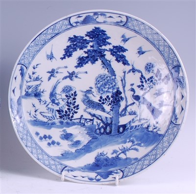 Lot 1316 - A Chinese export blue and white shallow bowl,...