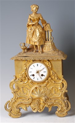 Lot 1383 - A mid-19th century gilt bronze mantel clock,...