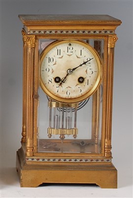 Lot 1387 - A circa 1900 French lacquered brass cased four...