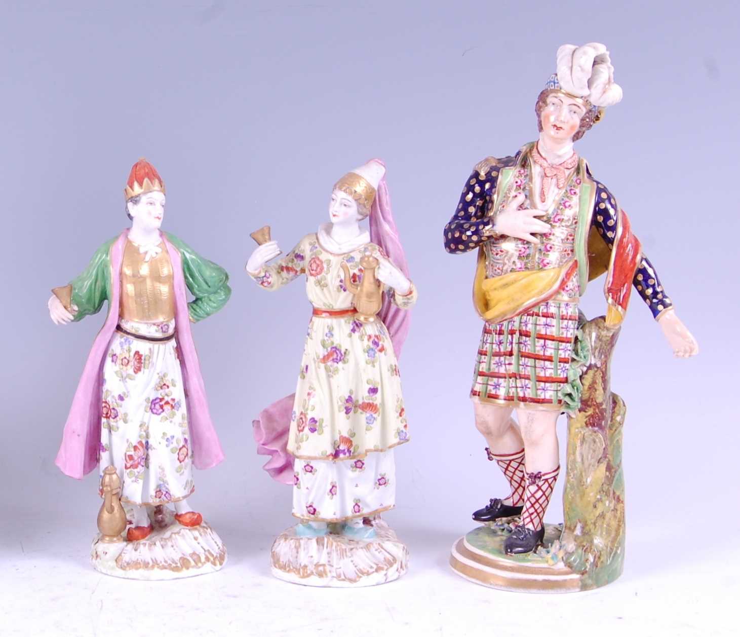 Lot 1013 - A pair of 19th century soft-paste porcelain...