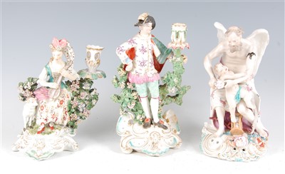 Lot 1022 - A Derby porcelain bocage candle-holder figure...