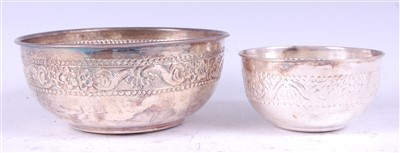 Lot 1320 - An Indian silver bowl, having embossed band of...