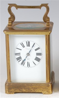 Lot 1372 - A late 19th century French lacquered brass...