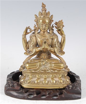 Lot 1327 - A gilt bronze figure of the Tibetan goddess...