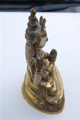 Lot 1327 - A gilt bronze figure of the Tibetan goddess...