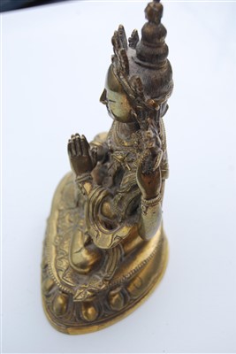 Lot 1327 - A gilt bronze figure of the Tibetan goddess...
