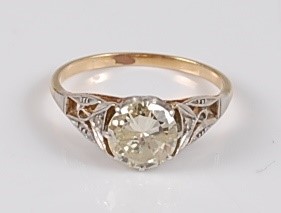 Lot 1227 - A yellow and white metal single stone diamond...