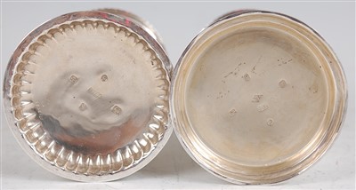 Lot 1167 - A matched pair of late Victorian silver sugar...