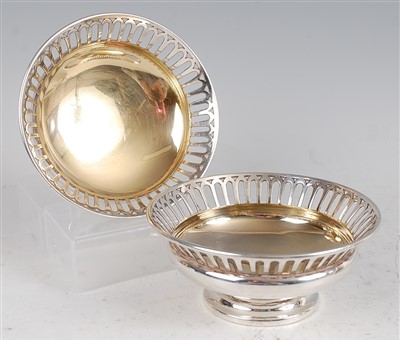 Lot 1105 - A pair of Edwardian silver bonbon dishes, each...