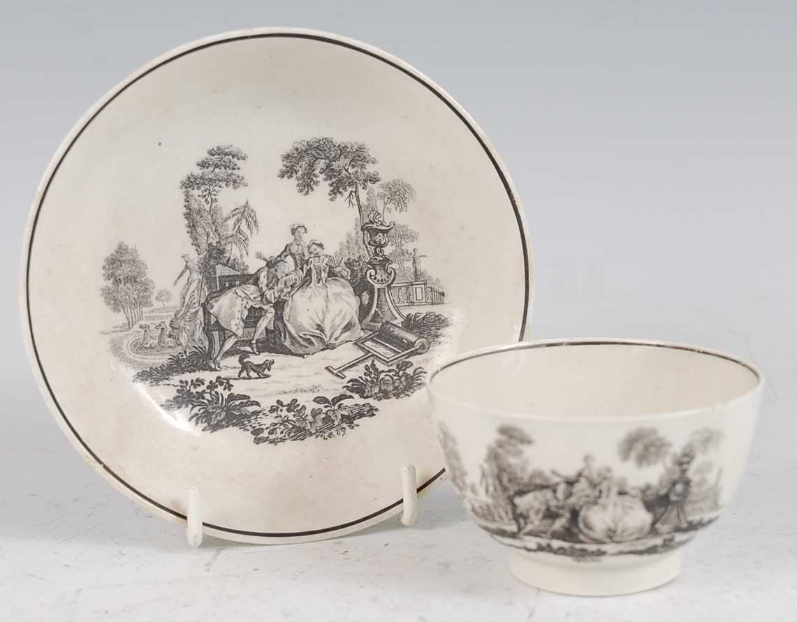 Lot 1029 - An 18th century porcelain tea bowl on stand,...