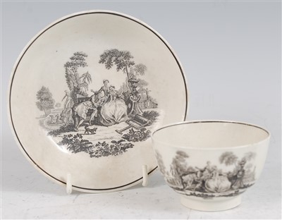 Lot 1029 - An 18th century porcelain tea bowl on stand,...