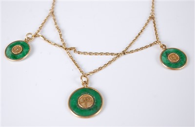Lot 1222 - A Chinese yellow metal and jade necklace,...