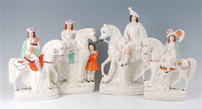 Lot 1053 - A matched pair of Victorian Staffordshire...