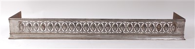 Lot 1425 - A George III cut steel fire fender, the frieze...