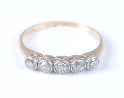 Lot 2632 - A yellow and white metal five stone diamond...