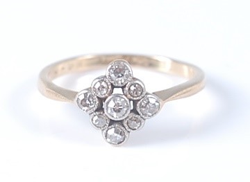 Lot 2633 - An 18ct yellow gold marquise shaped diamond...