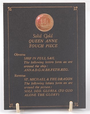 Lot 2144 - A replica Queen Anne 9ct gold touch piece,...