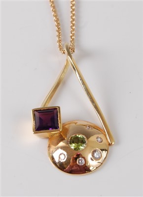 Lot 162 - An 18ct yellow gold abstract pendant,...