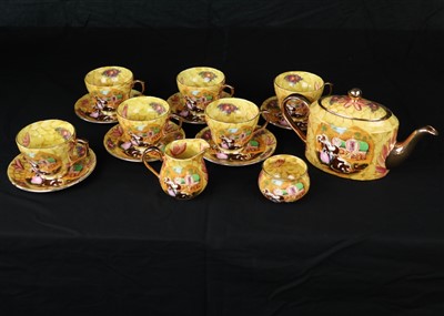 Lot 334 - A china tea set with gypsy scene decoration,...
