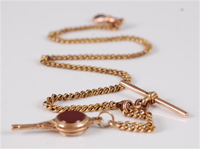 Lot 2695 - A 9ct gold flat curblink watch chain in two...