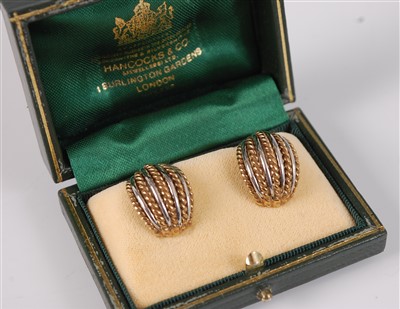 Lot 2700 - A pair of 9ct yellow and white gold ear clips,...