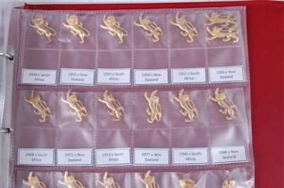 Lot 2708 - A large collection of enamelled sporting pin...