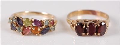 Lot 2664 - A 9ct yellow gold multi-stone ring, featuring...