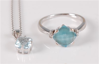 Lot 2667 - A white metal, blue topaz and diamond dress...