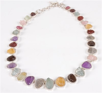 Lot 2692 - A contemporary silver multi-stone set necklet,...