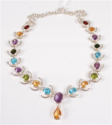 Lot 2713 - A contemporary silver and multi-gem set fringe...