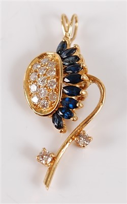 Lot 2717 - A yellow metal, sapphire and diamond set...