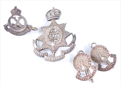 Lot 27 - An Indian Medical Service white metal pagri badge