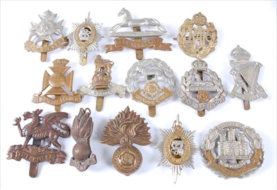Lot 33 - A large collection of cap badges and insignia to include