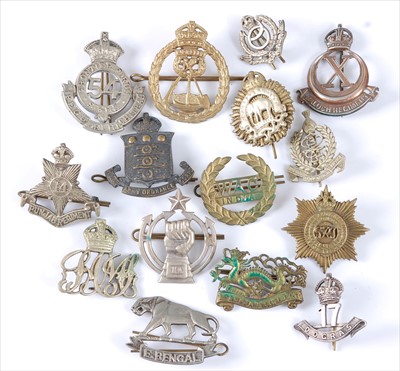 Lot 43 - A collection of mainly Indian/Nepalese Regiment cap badges and insignia to include