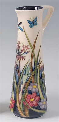 Lot 7 - A modern Moorcroft pottery ewer in the Walnut...