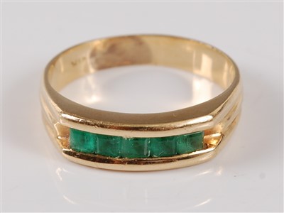 Lot 2772 - A yellow metal half hoop eternity ring,...