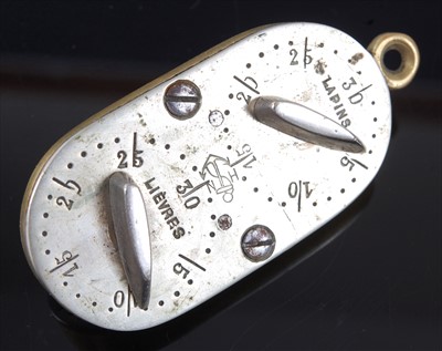 Lot 458 - A late 19th century French brass and nickel game counter