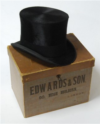 Lot 90 - An Edwardian brushed velvet top hat, bearing a...
