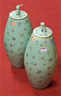 Lot 96 - A pair of Chinese vases and covers, each on...