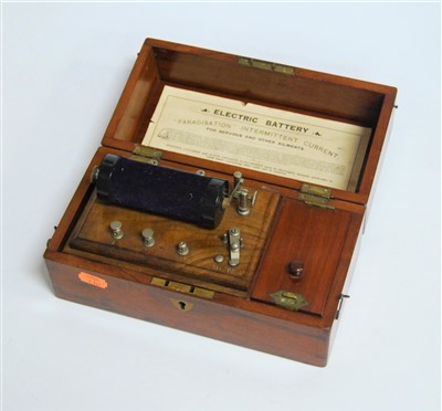 Lot 194 - A circa 1900 mahogany cased electric current...