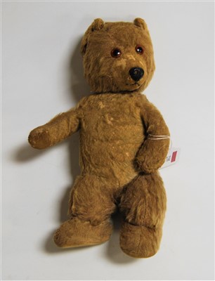 Lot 235 - A mid-20th century clockwork mohair musical...