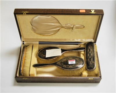 Lot 260 - A tortoiseshell and silver backed lady's...