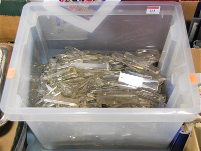 Lot 263 - A box of clear glass prism and lustre drops...